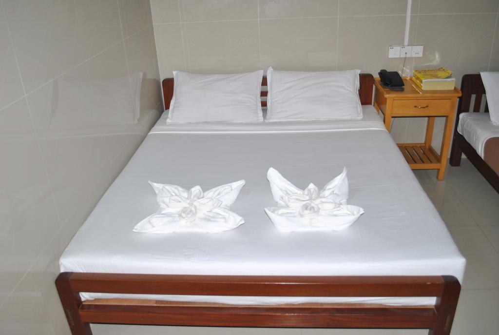 Royal Toe Hotel Yangon Quarto foto