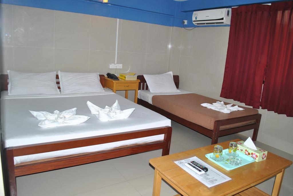 Royal Toe Hotel Yangon Quarto foto